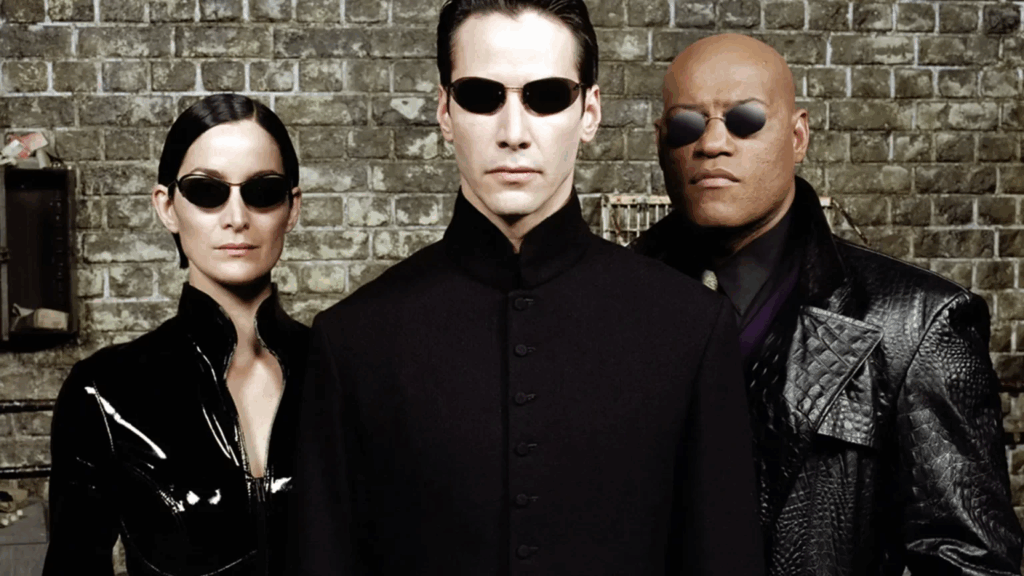 Trinity, Neo e Morpheus di Matrix fieri con i loro occhiali da sole